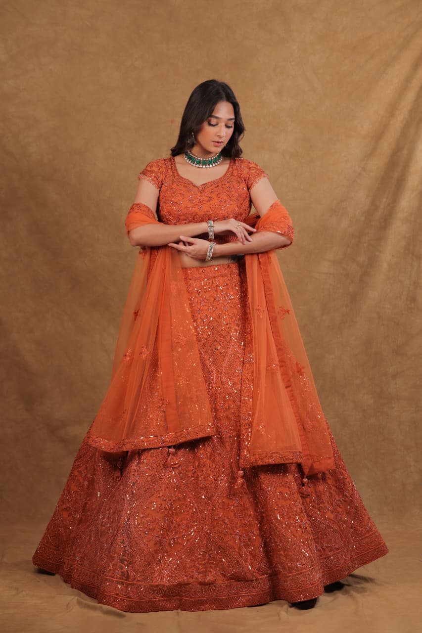 Rust Netted Chaniya Choli with Pearl, Sequence & Diamond Work