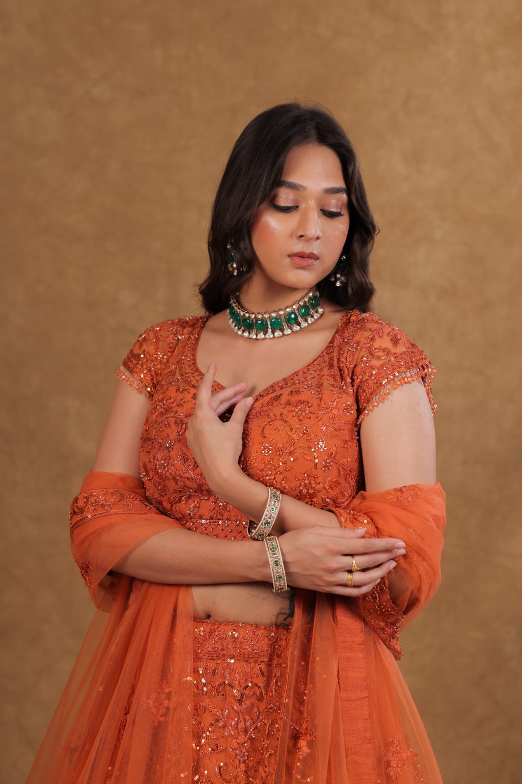 Rust Netted Chaniya Choli with Pearl, Sequence & Diamond Work